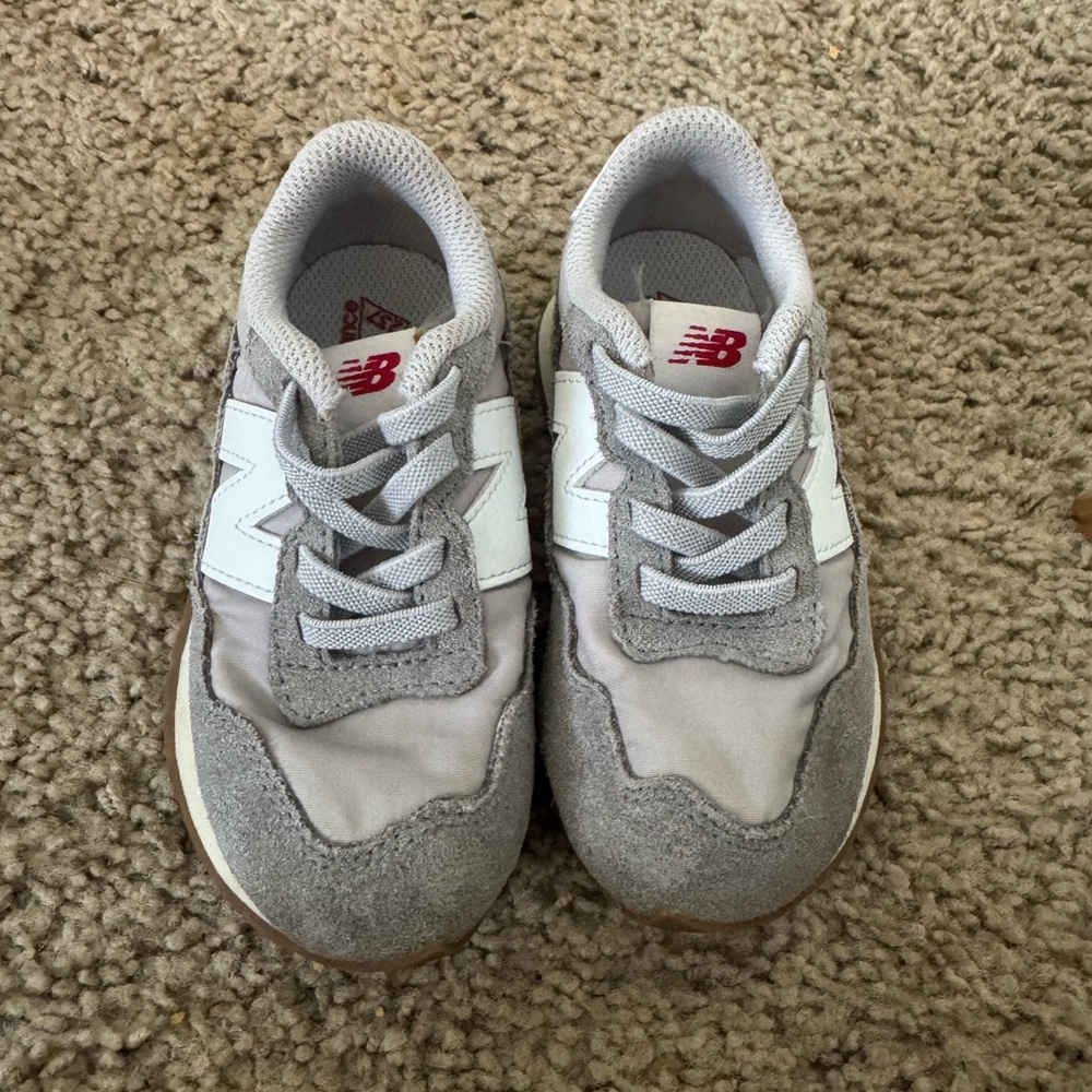 New Balance Kids Gray and White Sneakers